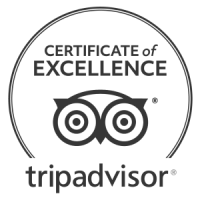 A TripAdvisor Certificate of Excellence badge with circular seal and the word &ldquo;tripadvisor&rdquo; beneath it.